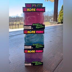 Needoh.  Nice Cube Kids Squishy Toy - Pink, Blue, Purple